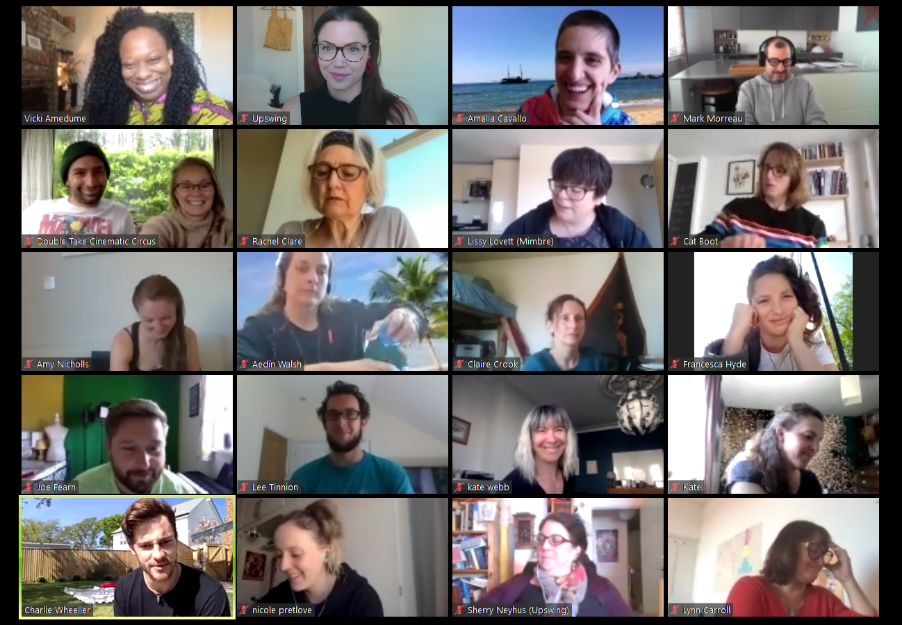 A screen shot of a zoom meeting with lots of people